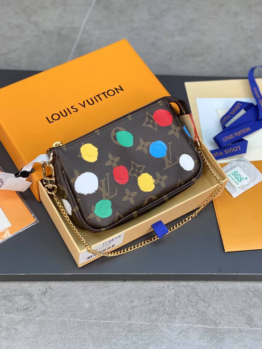 LV x Yayoi Kusama Mini Pochette Accessoires bag in the Monogram Multicolor pattern