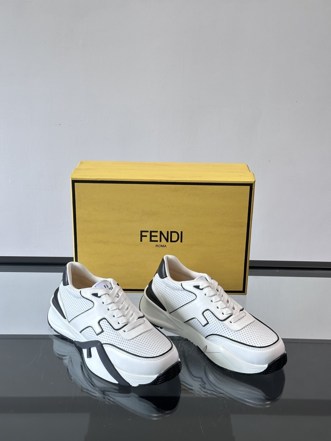 Fendi Flow leather sneakers in white with black