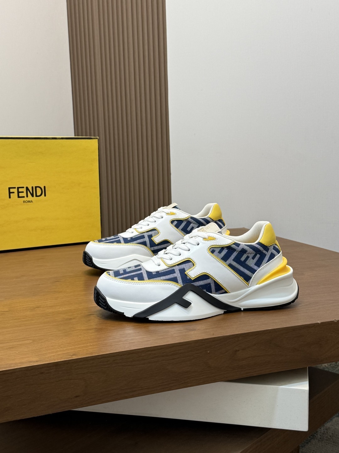 Fendi Flow sneakers in white, black, and blue with the FF jacquard motif
