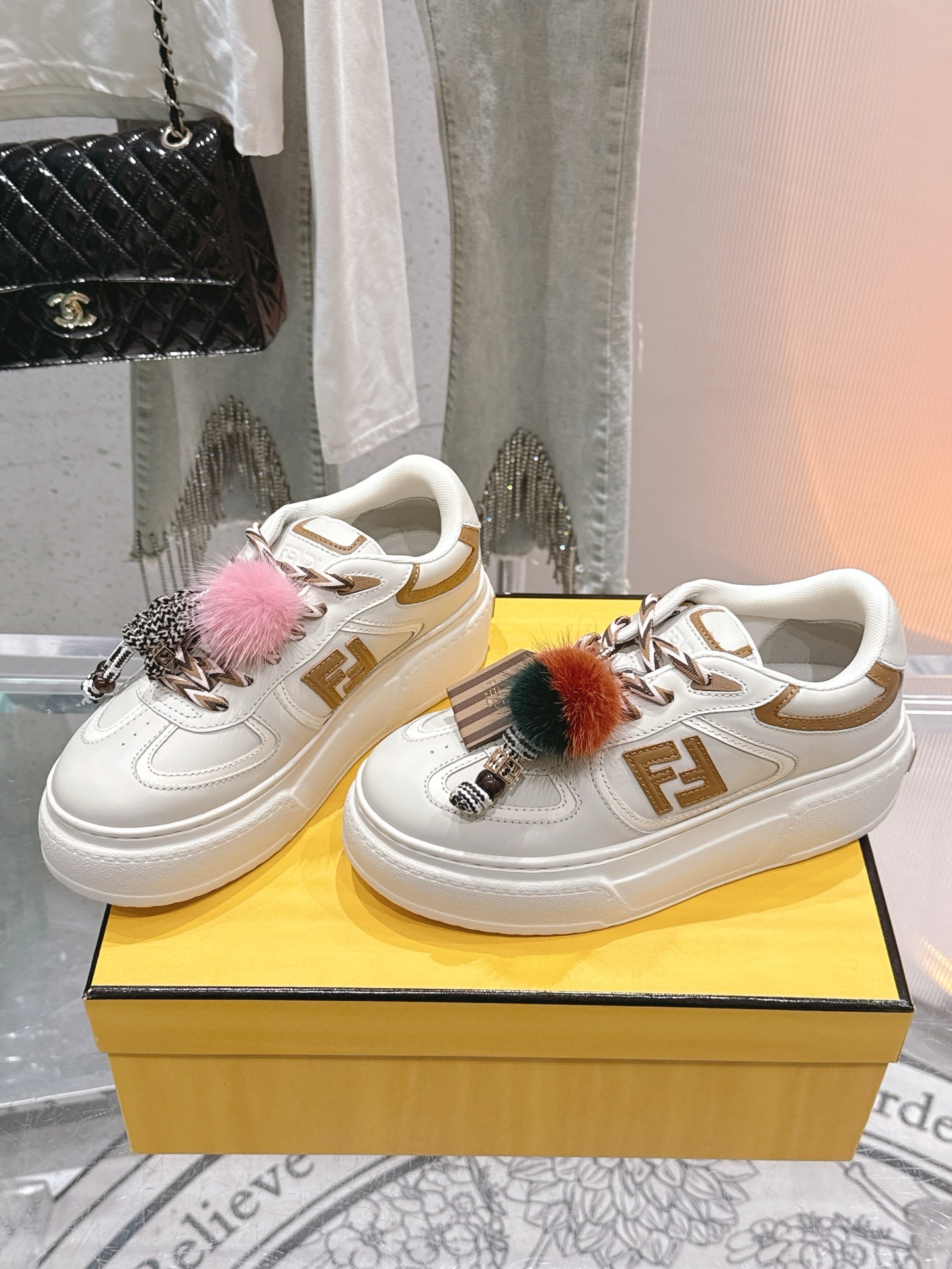 Fendi Match leather sneakers with charm in white, sienna brown, and pink