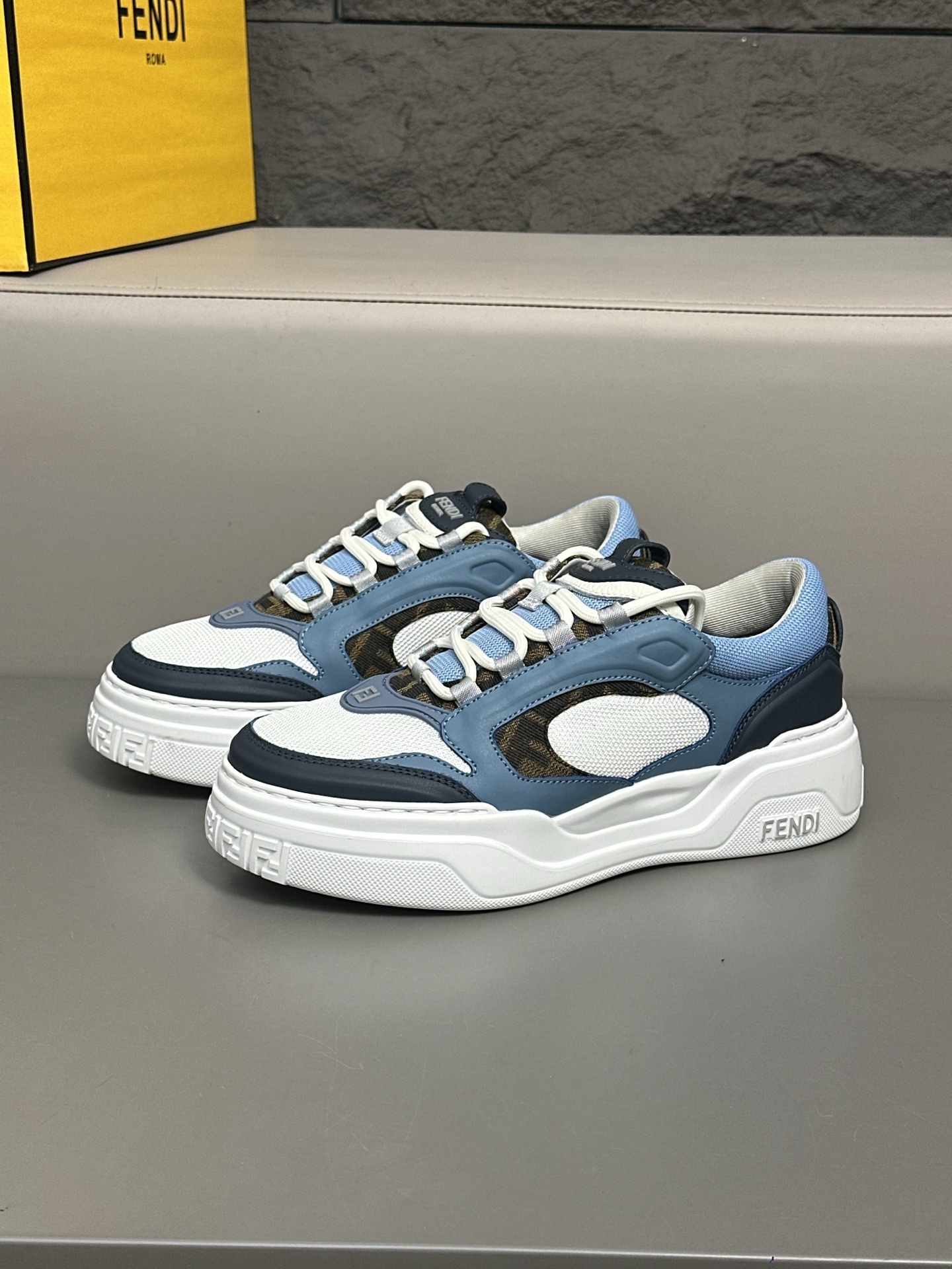 Fendi Force trainers in white, light blue, and blue leather