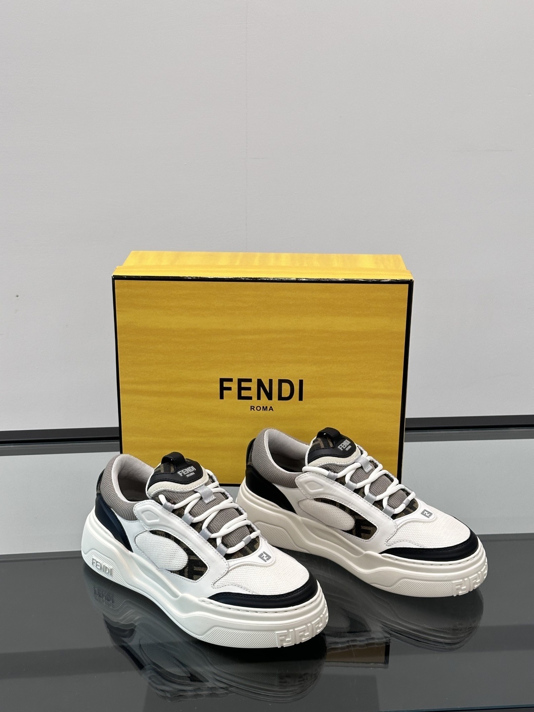 Fendi Force sneakers in white, black, and grey with FF jacquard
