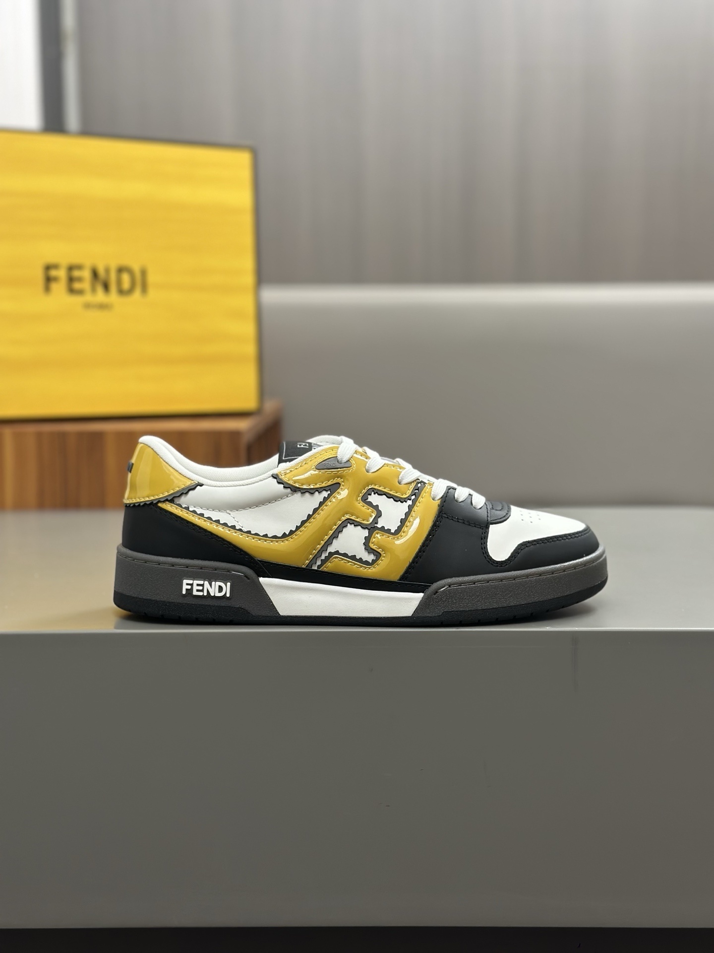 Fendi Match sneakers in a black, white, and yellow