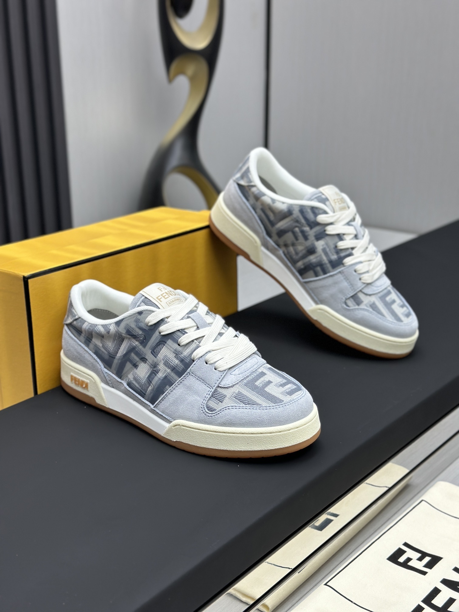 Fendi Match low-top sneakers in a grey FF jacquard fabric with light blue suede