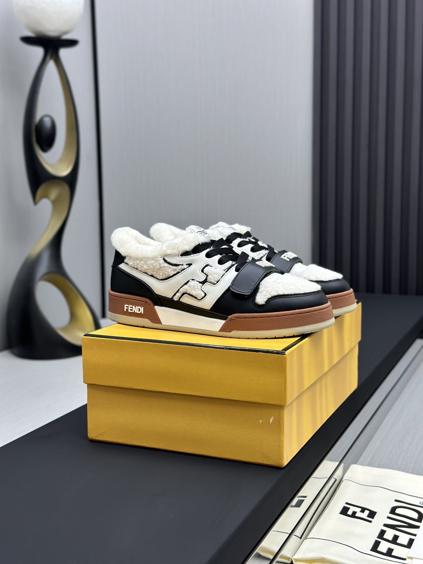 Fendi Match low-top sneaker made of black suede with white leather