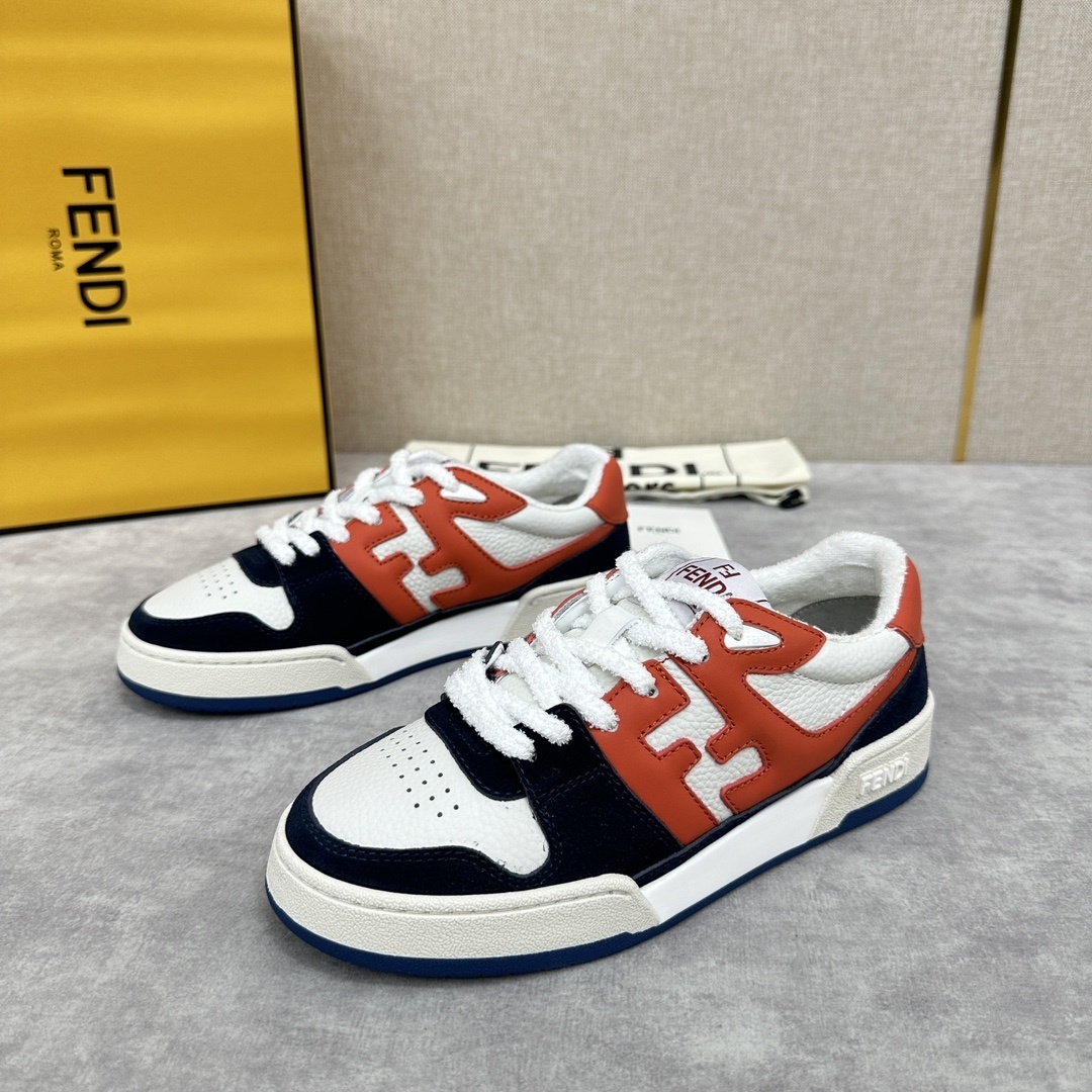 Fendi Match sneakers in a white, blue, and orange colorway with an FF logo pattern sewn on the side