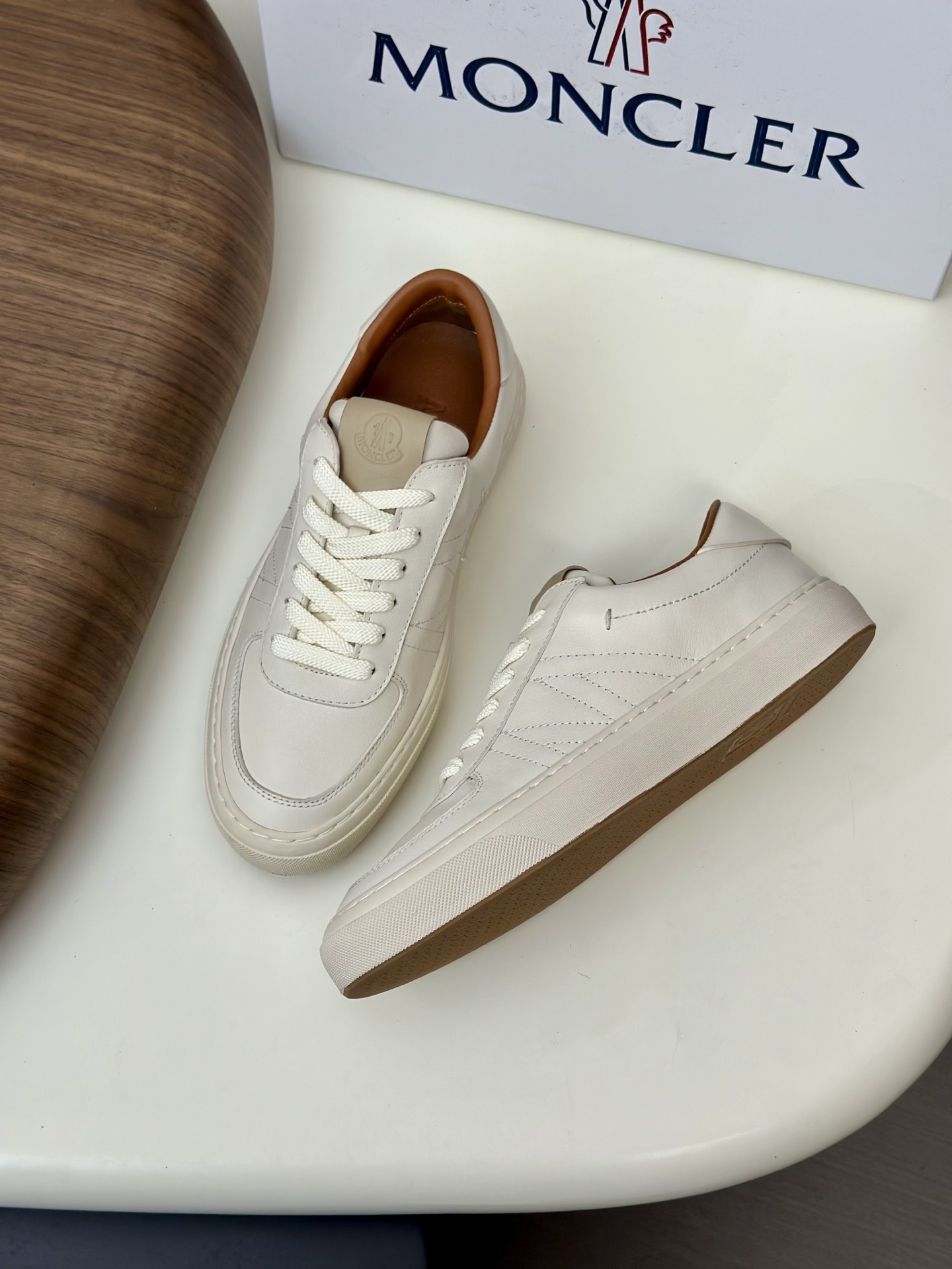 Moncler Monclub leather sneakers in an ecru/light beige