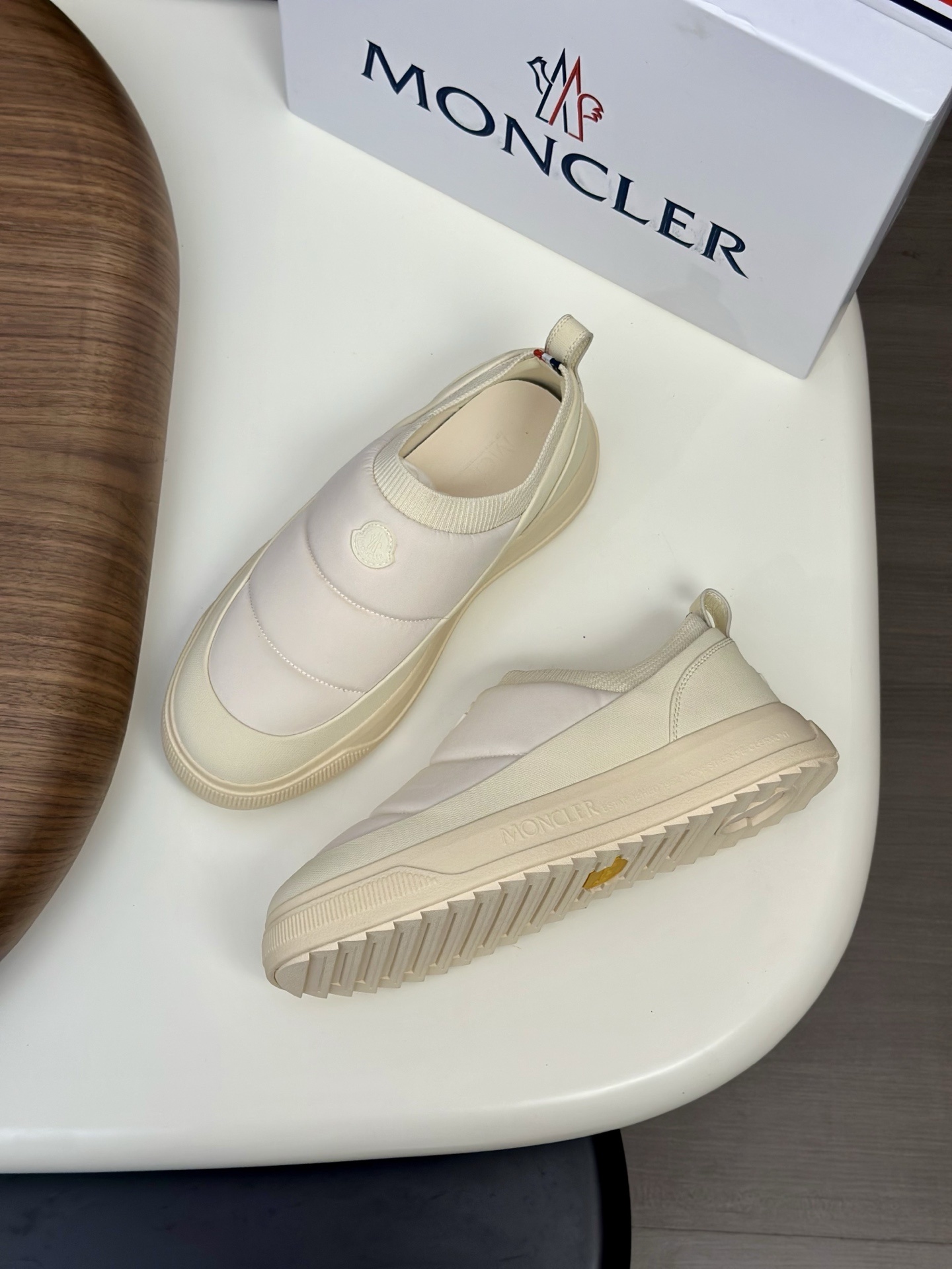 Moncler Altive slip-on sneakers in light beige.