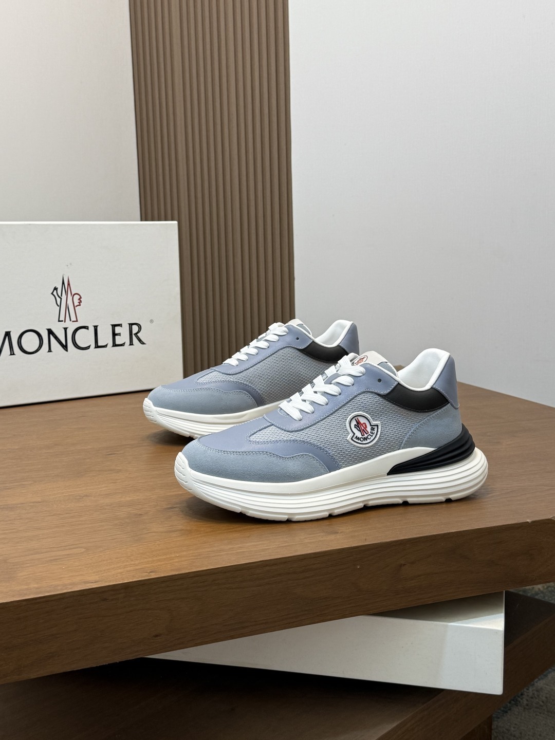 Moncler sneakers in a light blue and black