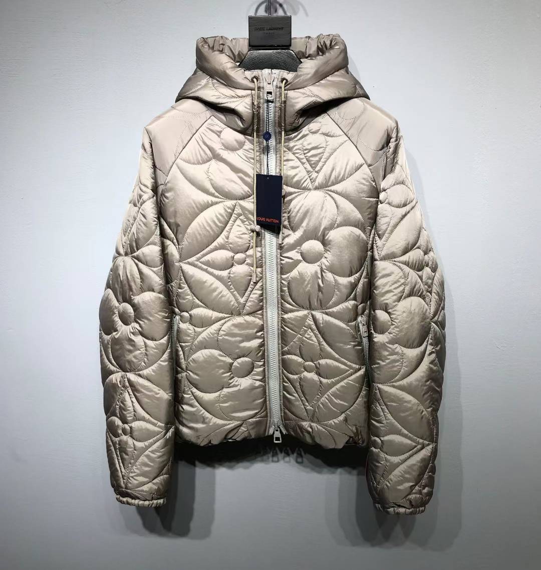 LV Reversible Monogram Puffer Jacket in a beige/silver