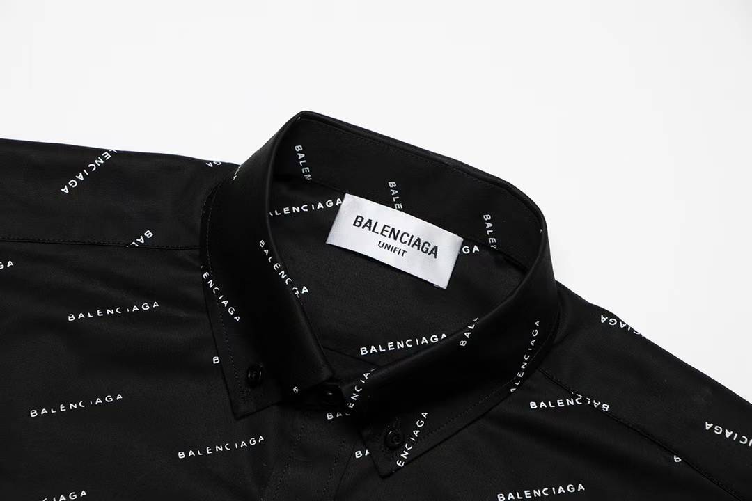 Balenciaga all-over logo shirt in black cotton.