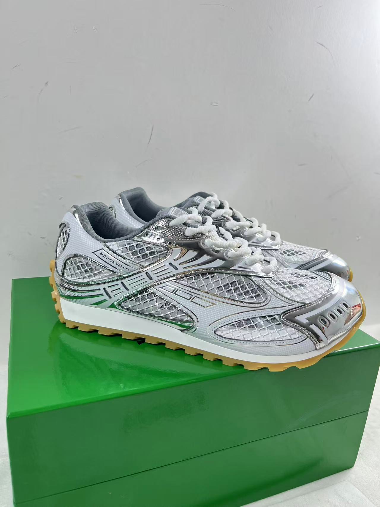 Bottega Veneta Orbit sneakers in silver and white technical mesh with metallic rubber details