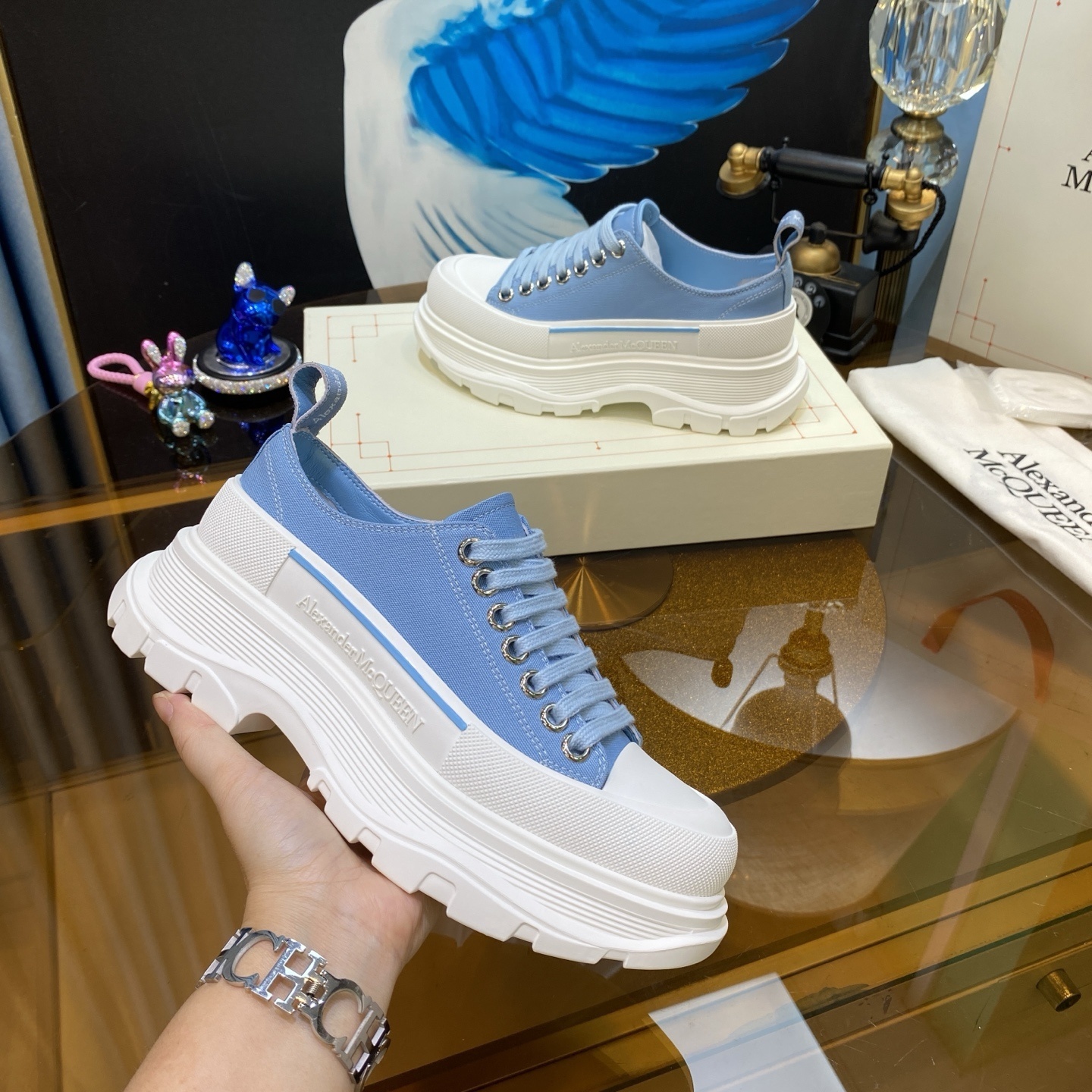 Alexander McQueen Tread Slick sneaker in a light blue and white colorway