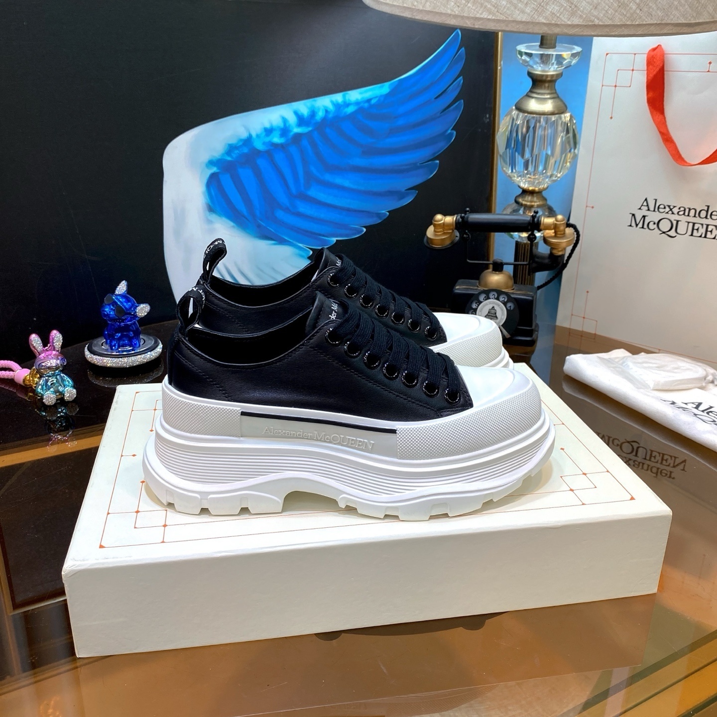 Alexander McQueen Tread Slick canvas sneakers in black and white