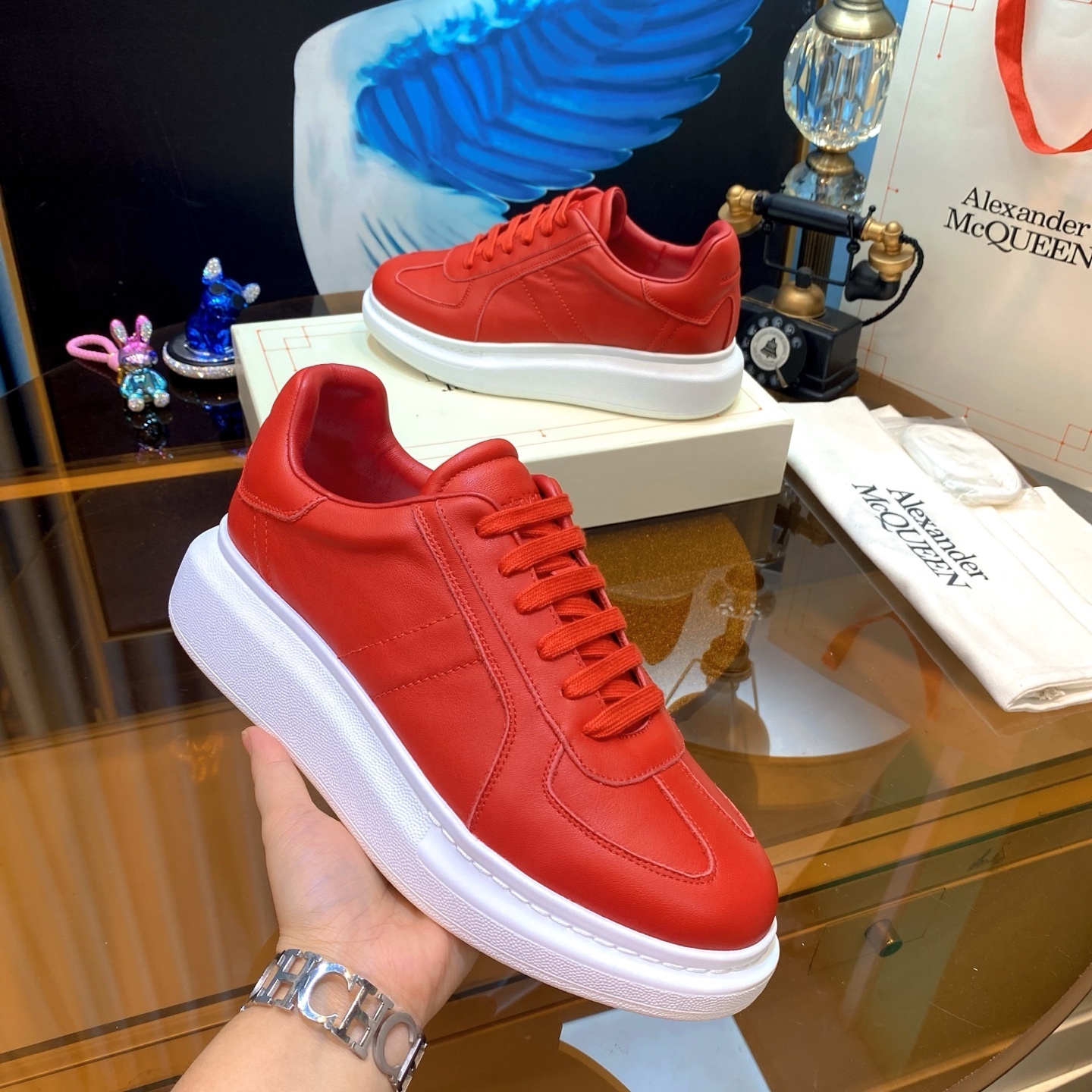 Alexander McQueen Oversized Sneakers in red calf leather with a white rubber sole
