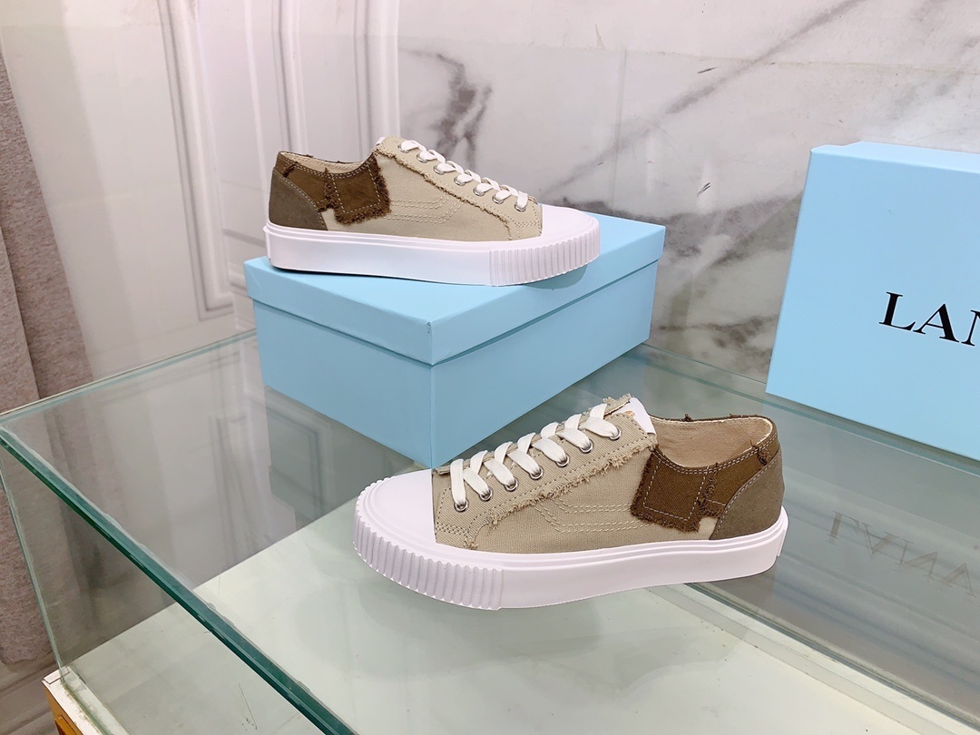 Lanvin men's casual canvas sneakers with a distressed look and a white rubber sole