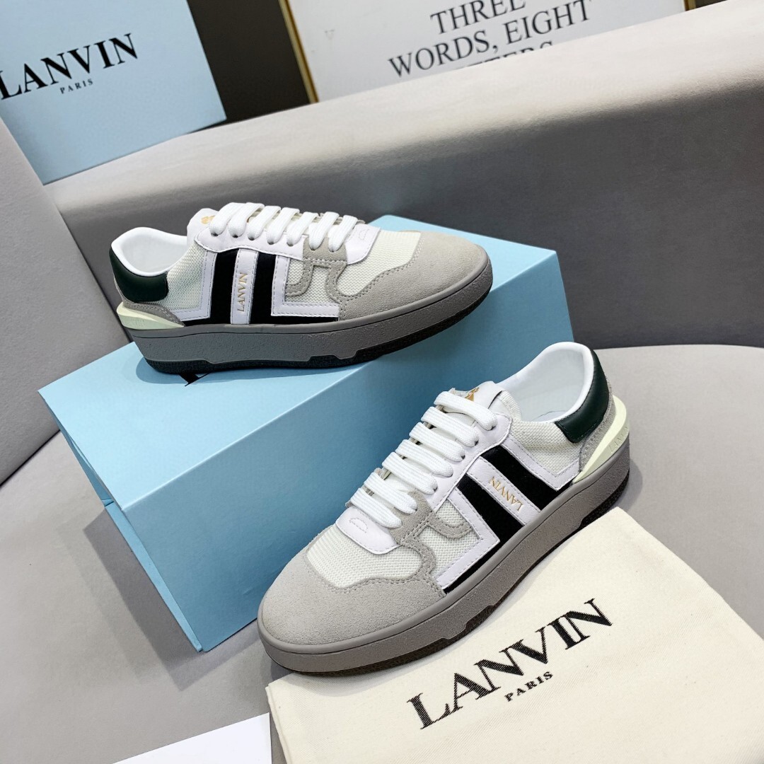 Lanvin Clay low-top sneakers in white and grey calf leather, suede, and fabric with black contrasting panels