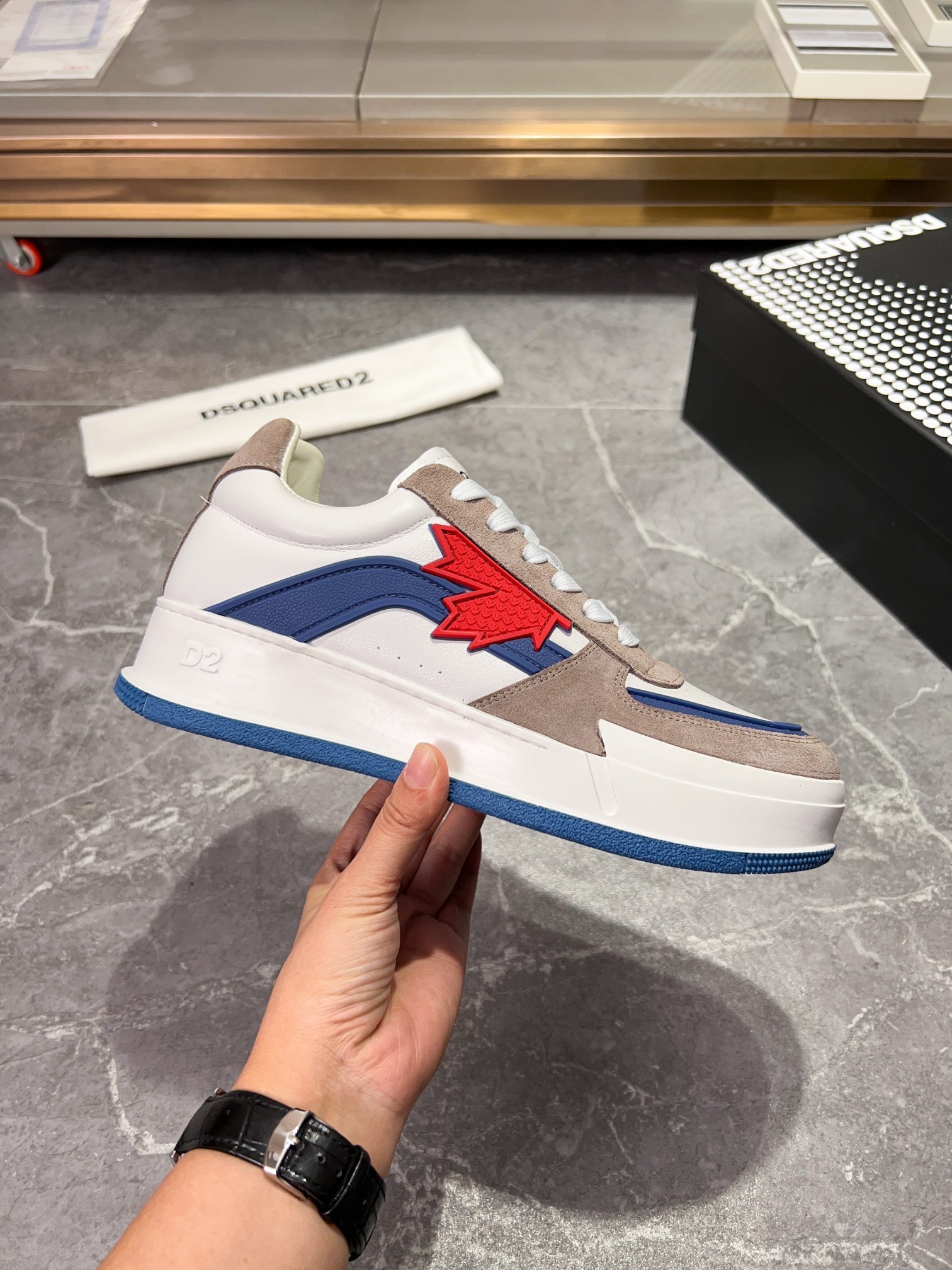 Dsquared2 Canadian leather low-top sneakers in white, blue, and grey with a red maple leaf patch