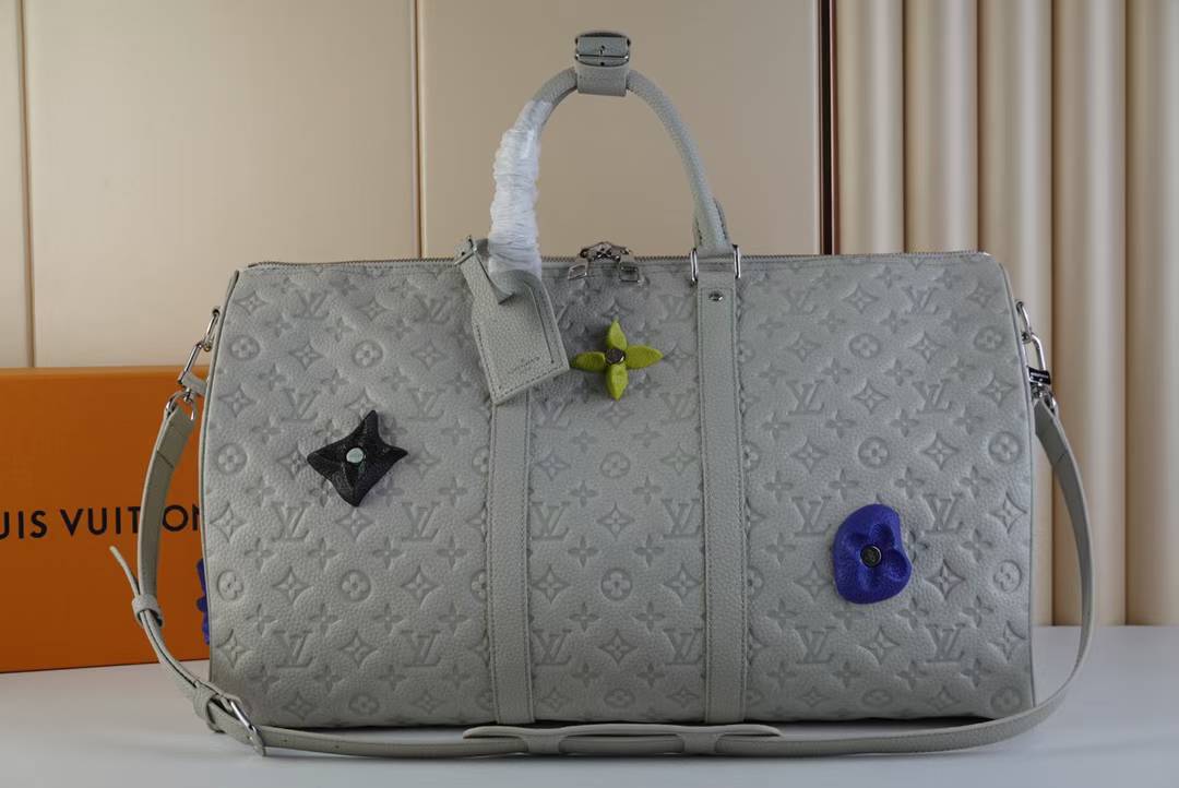 LV Keepall 50 duffle bag in granite-colored embossed leather