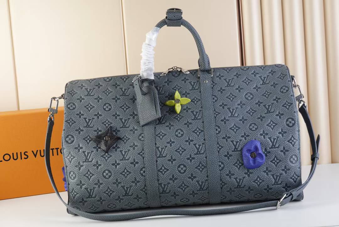 LV Keepall Bandouliere 50 duffel bag in the gray Taigarama canvas and leather
