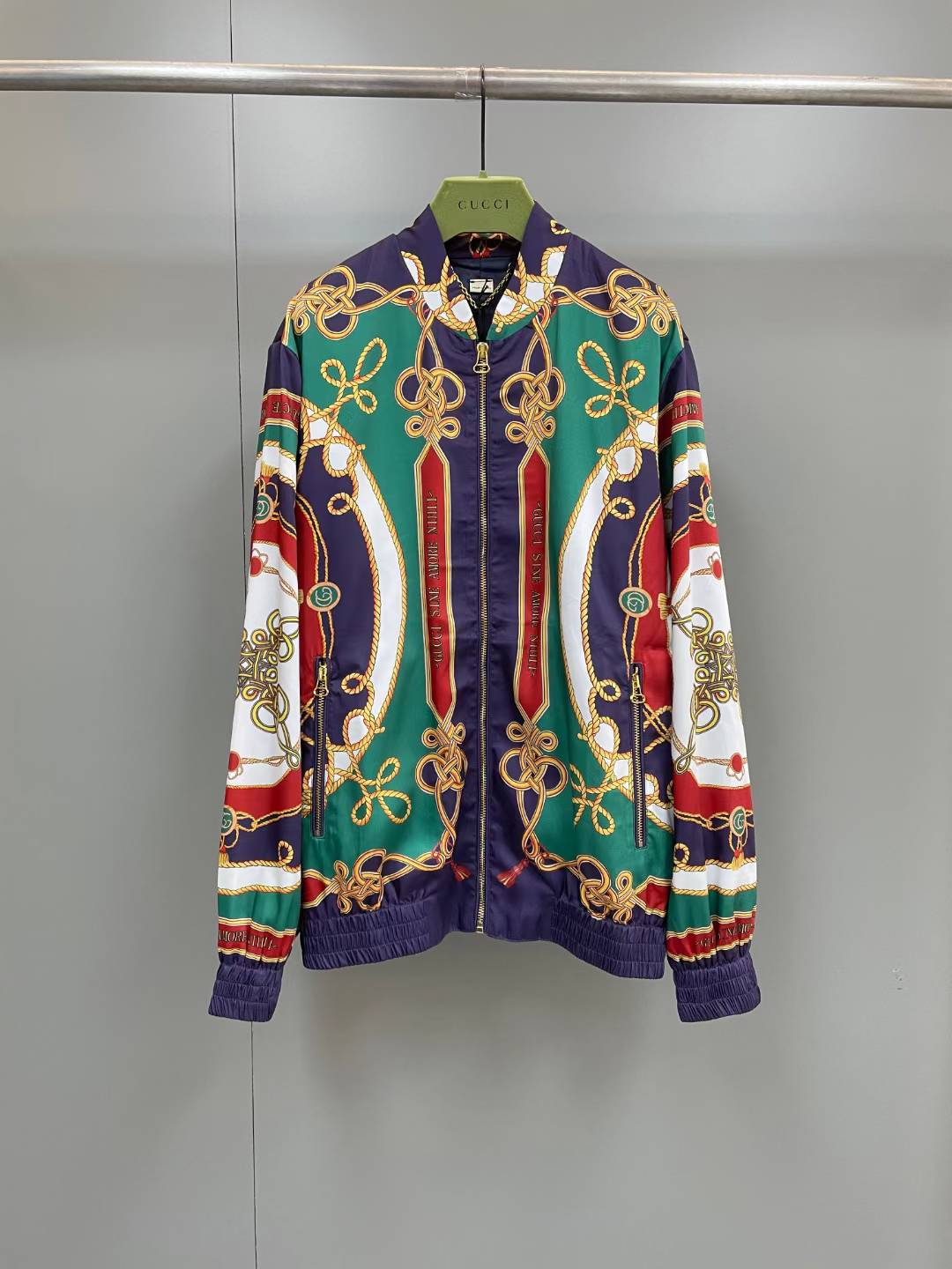 Gucci silk jacket with a torchon print in green