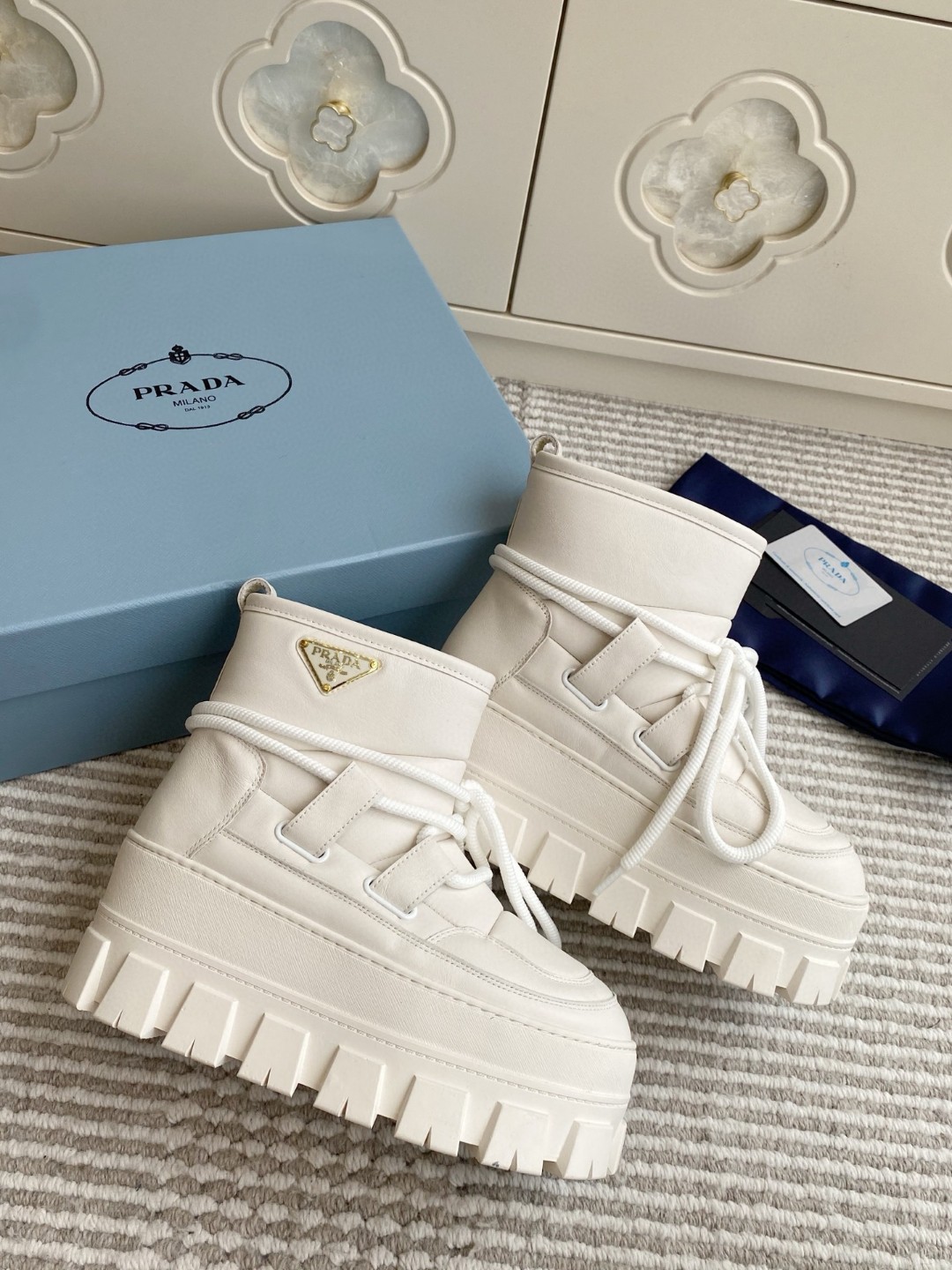 Prada Re-Nylon gabardine après-ski boots chunky lug tread rubber sole