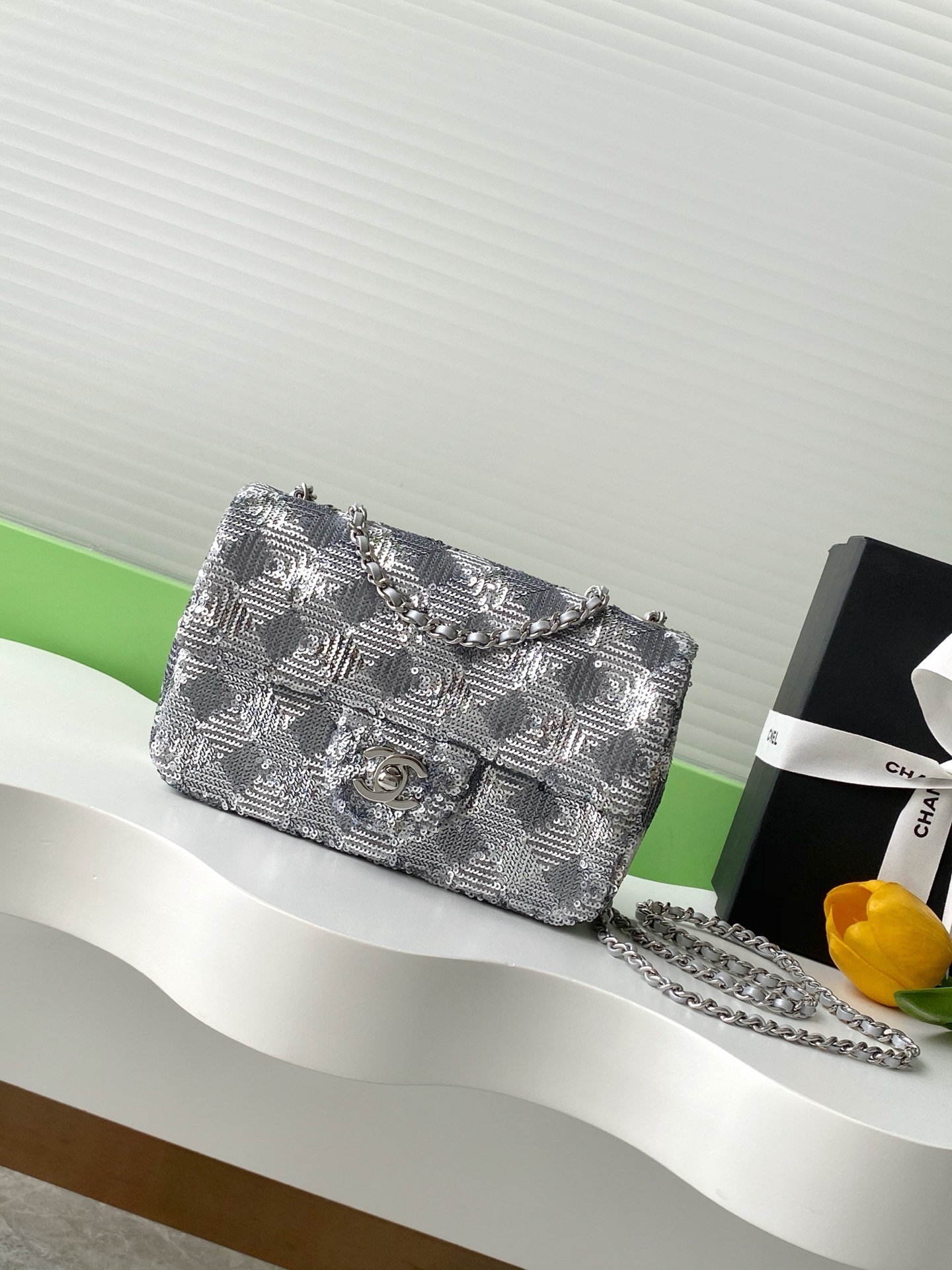 Chanel flap bag with a sequin design in a silvery and black