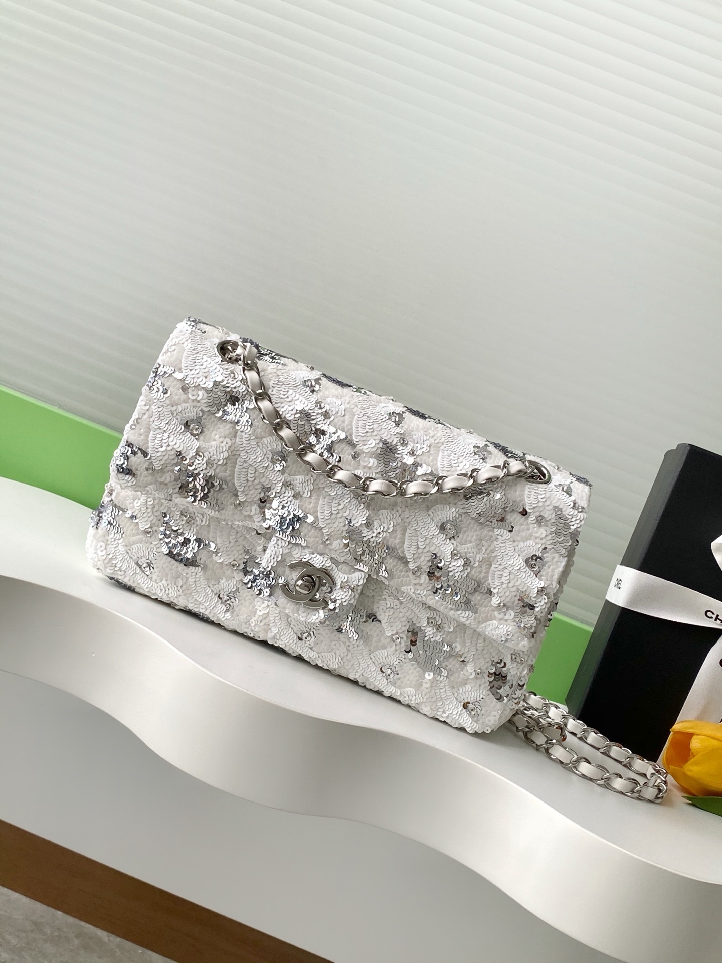Chanel sequin mini flap bag in white with a floral pattern and silver-tone hardware
