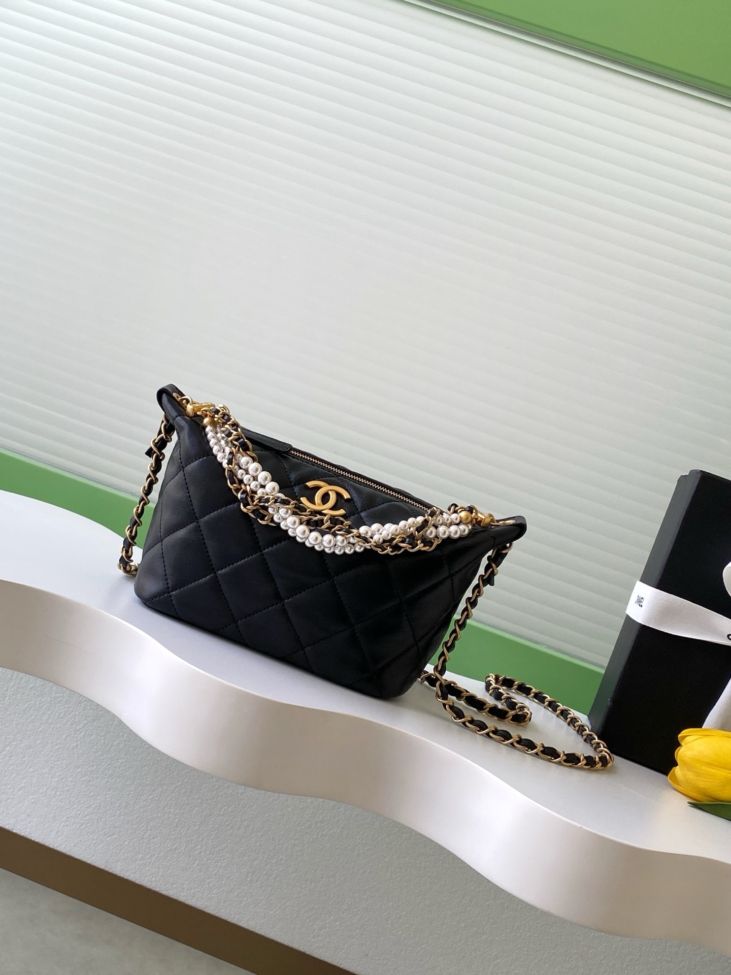 Chanel Matelassé Pearl Handle Chain shoulder bag in black lambskin with gold-plated hardware