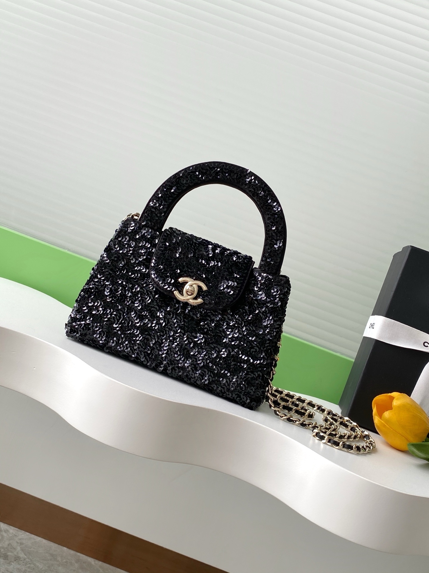 Chanel Mini Shopping Bag made of sequins and gold-tone metal, in black, from the Cruise 2025 collection