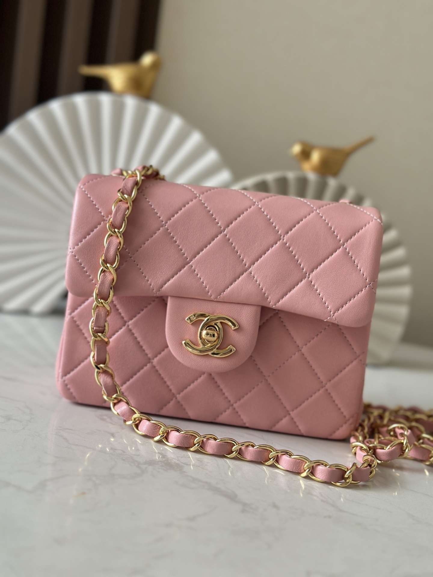 Chanel Classic Mini Square Flap bag in pink quilted lambskin leather with gold-tone hardware