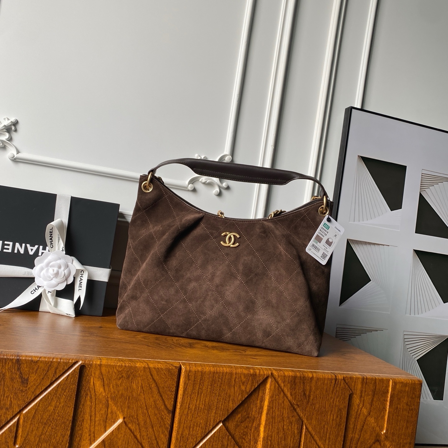 Chanel Maxi Hobo Bag in dark brown suede calfskin and lambskin with gold-tone metal hardware