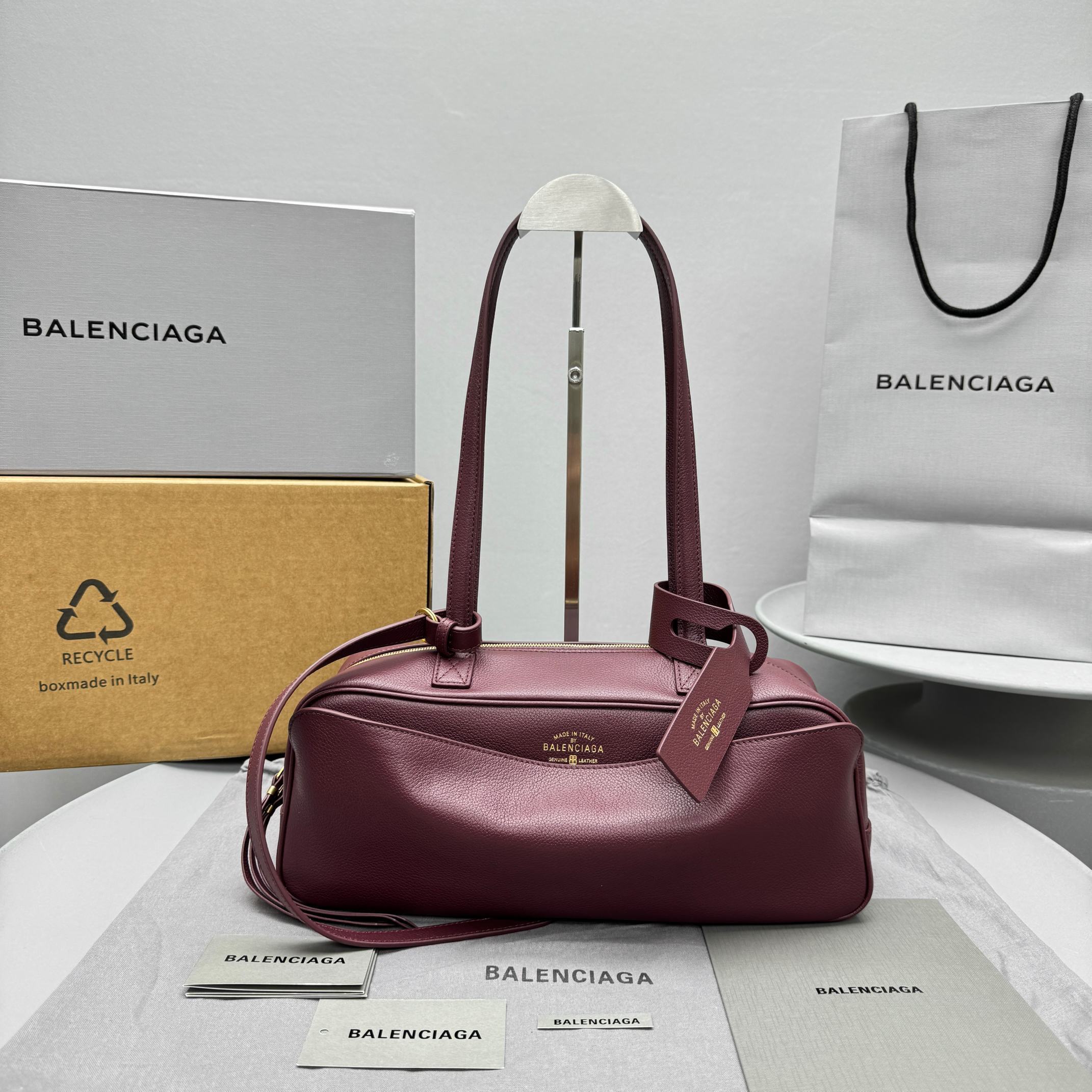 Balenciaga Carrie small bowling bag in dark burgundy calfskin leather