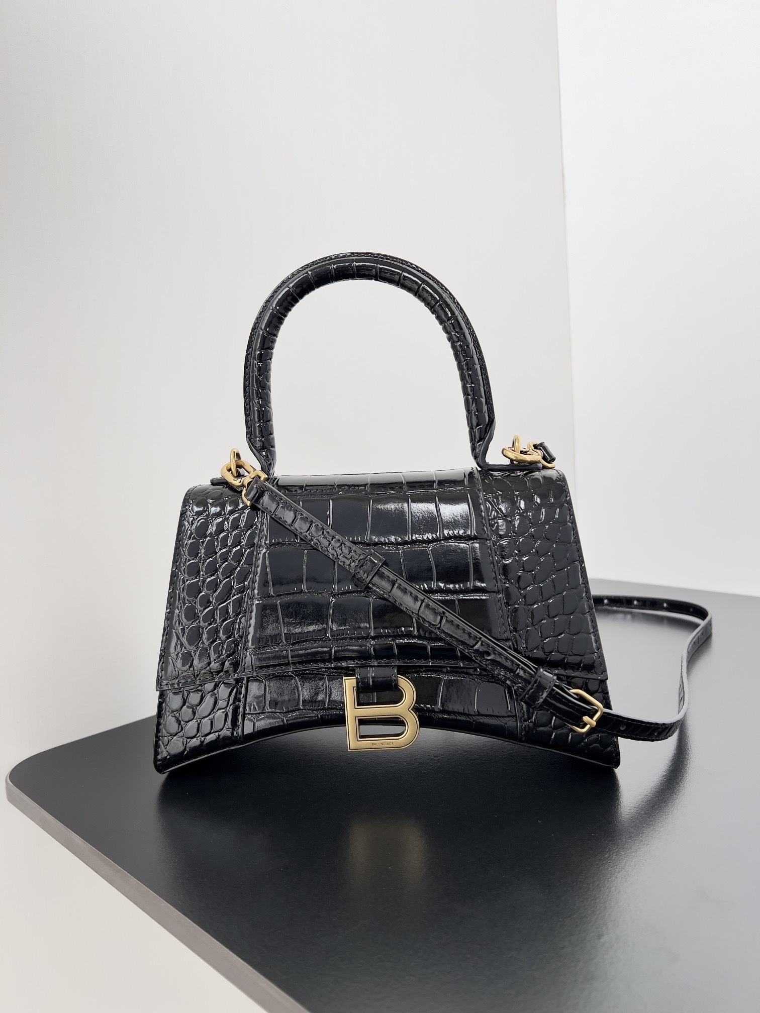 Balenciaga Small Hourglass top-handle bag in black crocodile-embossed calfskin with gold-tone hardware