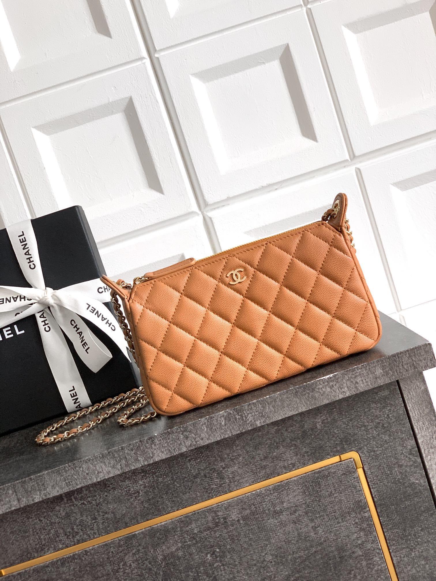 Chanel Timeless Classic Line Chain Clutch in a caramel brown/tan leather, model 4704
