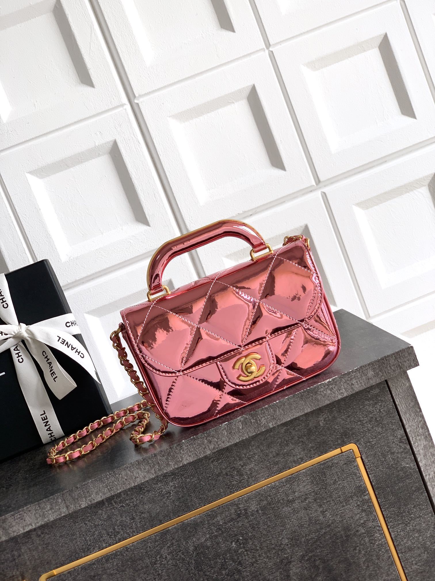 Chanel Mini Top Handle Flap bag in pink metallic calfskin leather