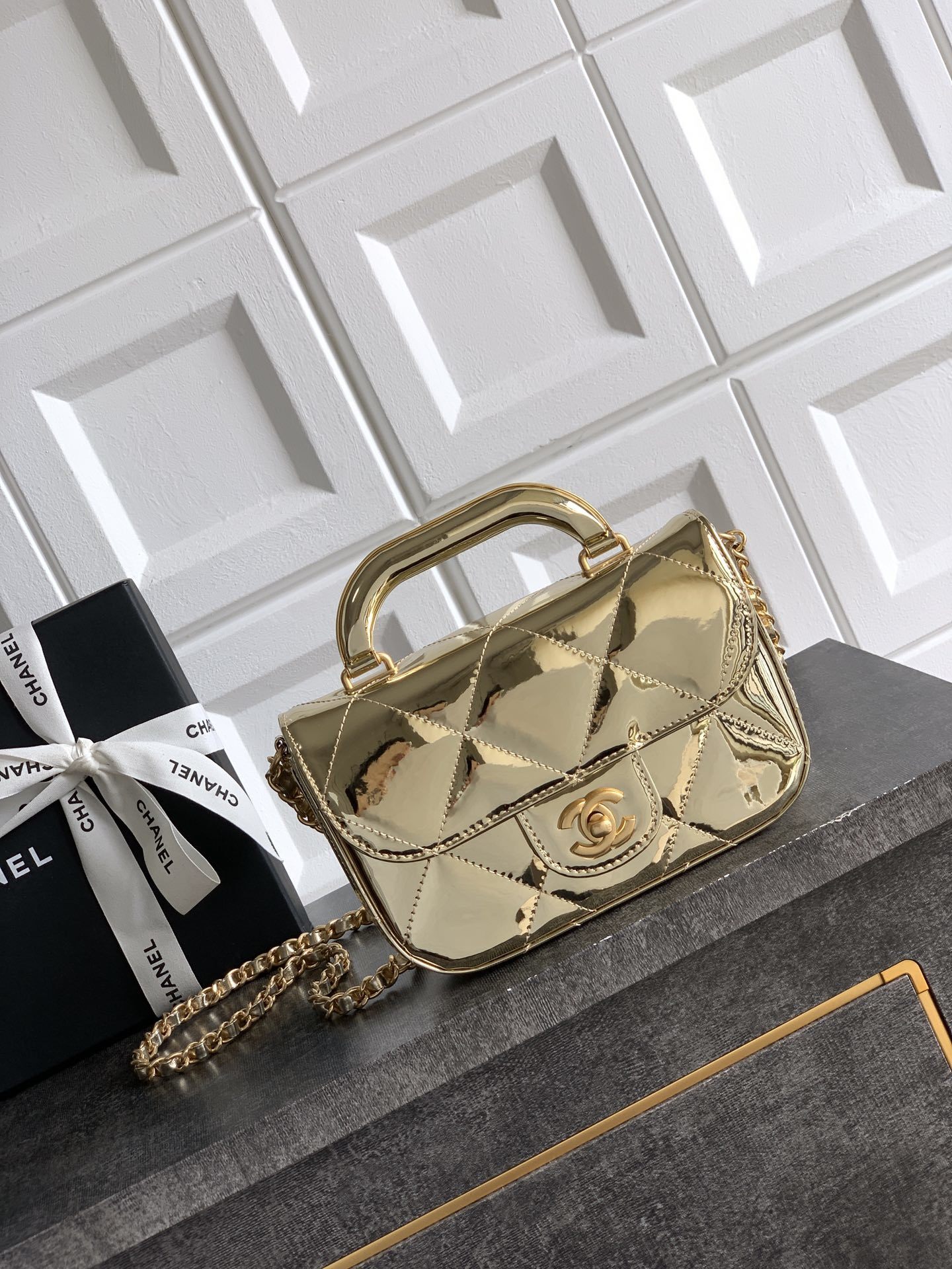 Chanel Small Clutch with Chain in high-shine calfskin and gold metal