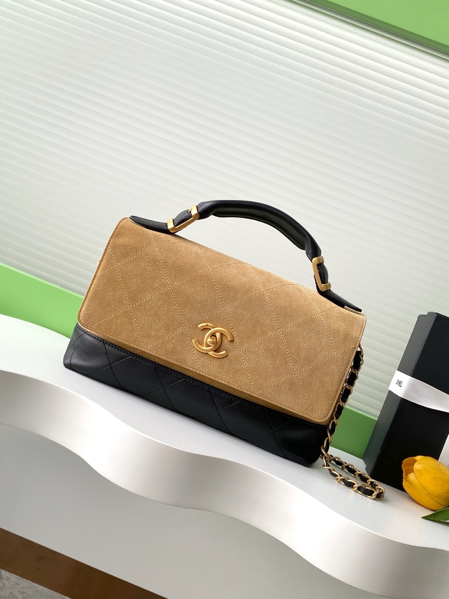 Chanel large flap bag with top handle in beige suede calfskin and black shiny lambskin with gold-tone metal hardware