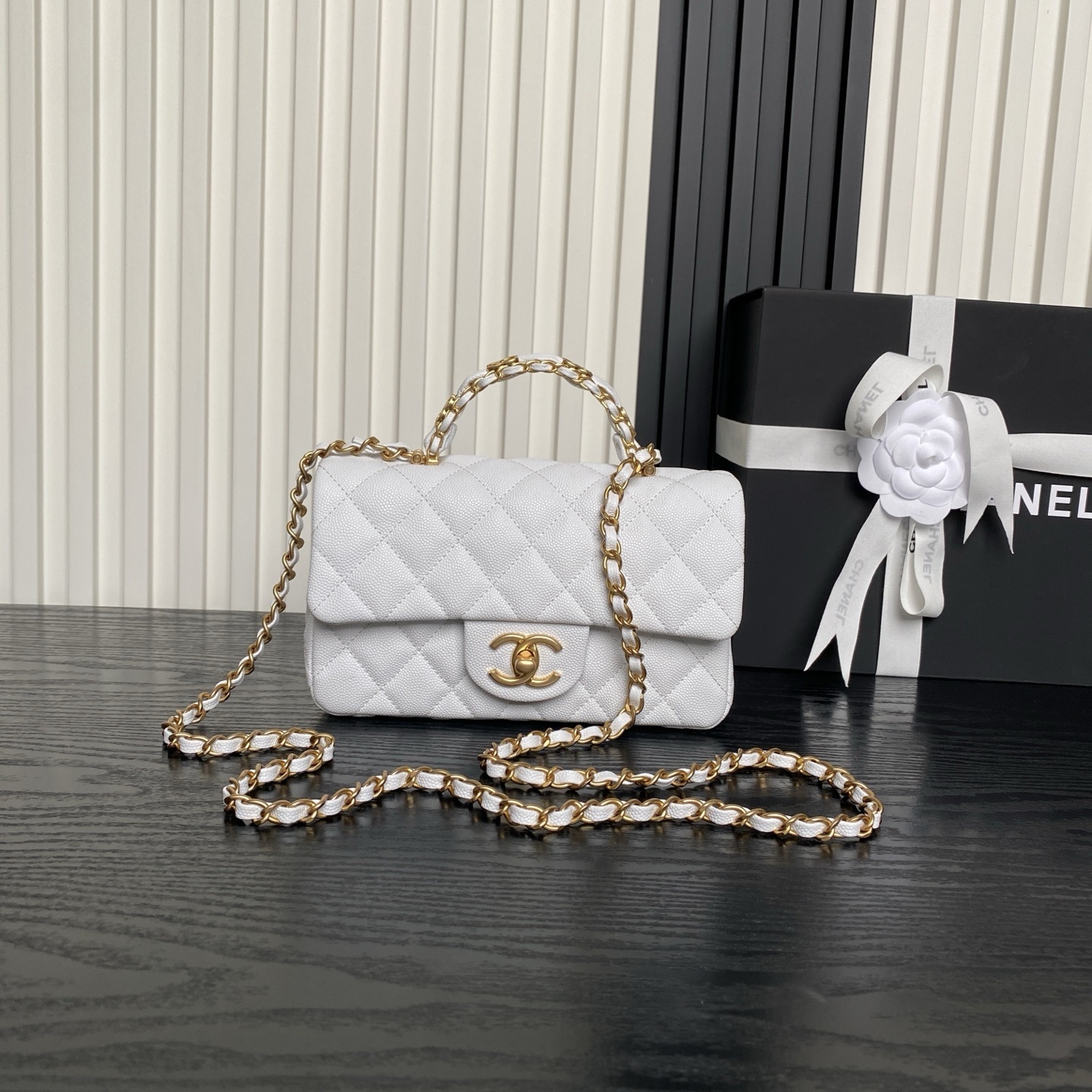 Chanel 25B mini top handle flap bag in white caviar leather with gold-tone hardware