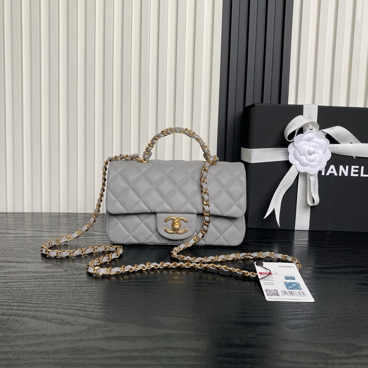 Chanel Mini Rectangular flap bag with top handle in grey lambskin leather and antique gold-tone hardware