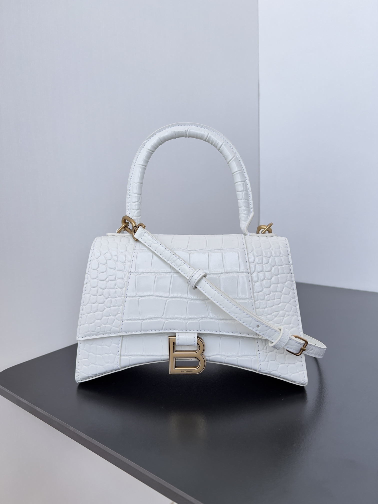 Balenciaga Hourglass top handle bag in a crocodile-effect leather finish