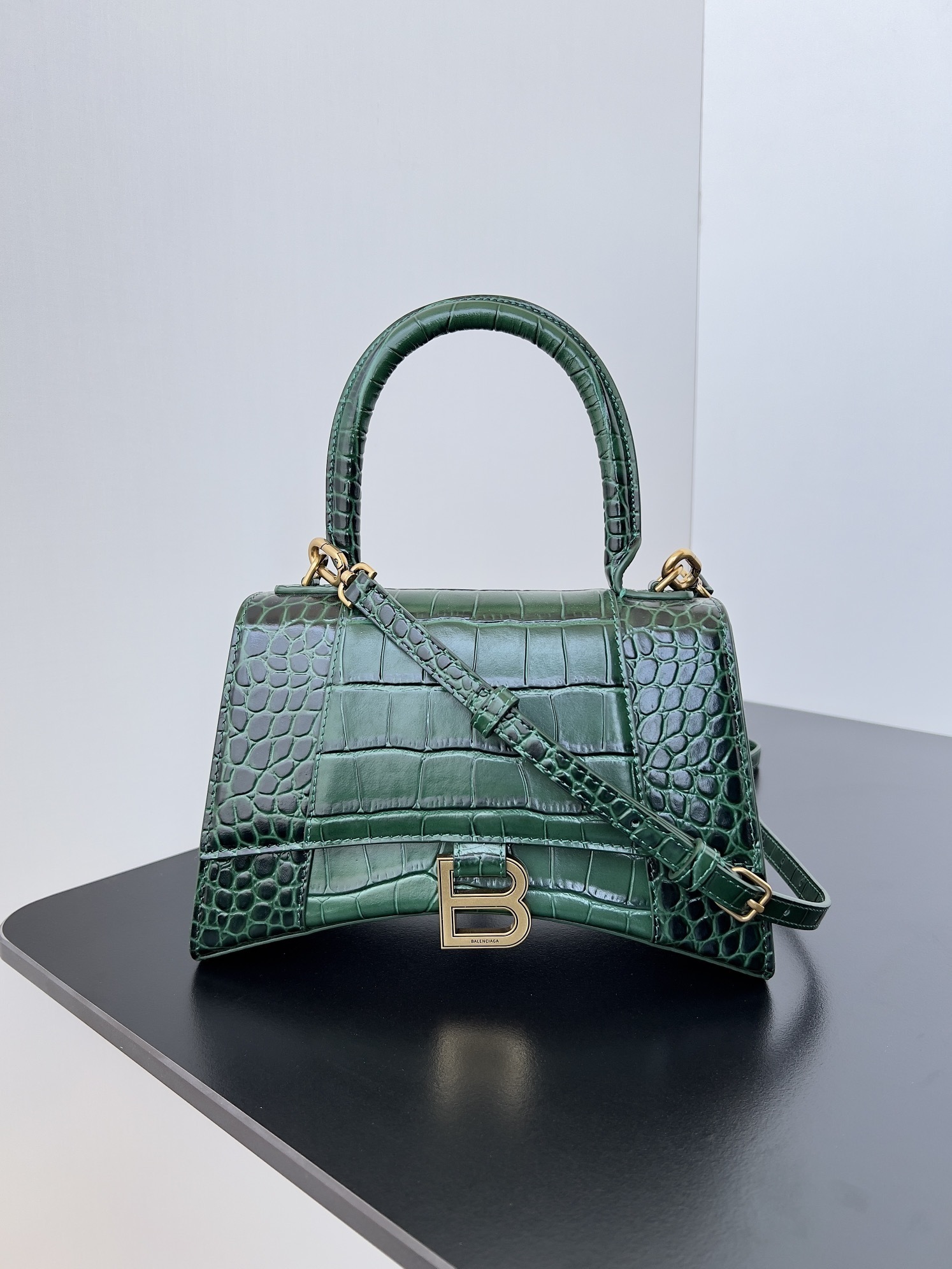 Balenciaga Hourglass Small top-handle bag in shiny green crocodile-embossed calfskin with a gold-tone 'B' logo