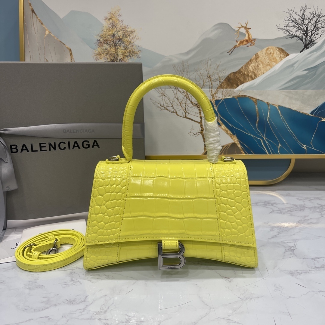 Balenciaga Hourglass top-handle bag in a fluo yellow croc-embossed leather finish
