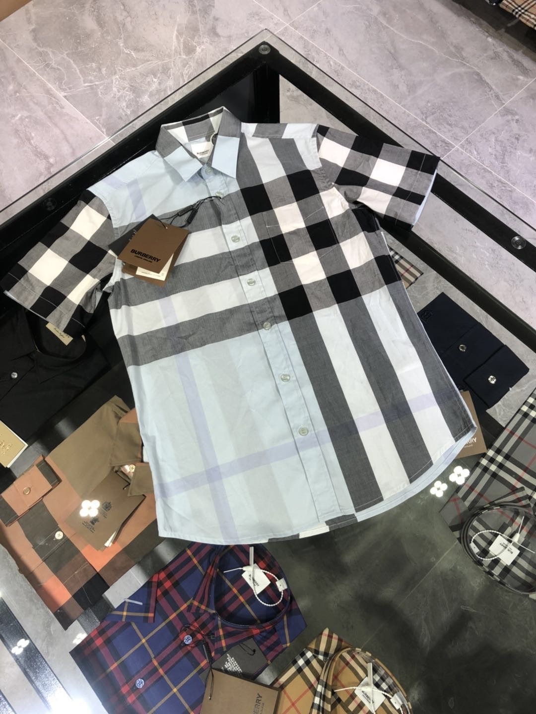 Burberry short-sleeved shirt archive beige, black, and light blue check pattern in cotton