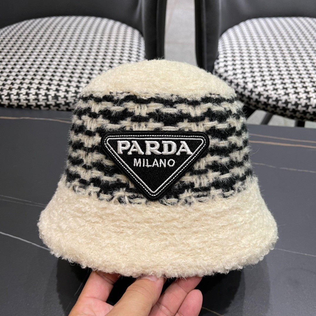 Prada black and white tweed or bouclé bucket hat