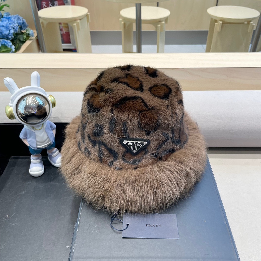 Prada shearling bucket hat with a leopard print pattern