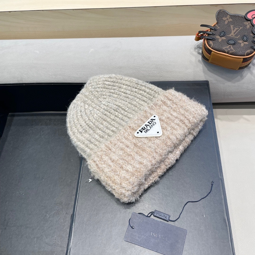 Prada wool and cashmere ribbed-knit beanie with a triangle logo