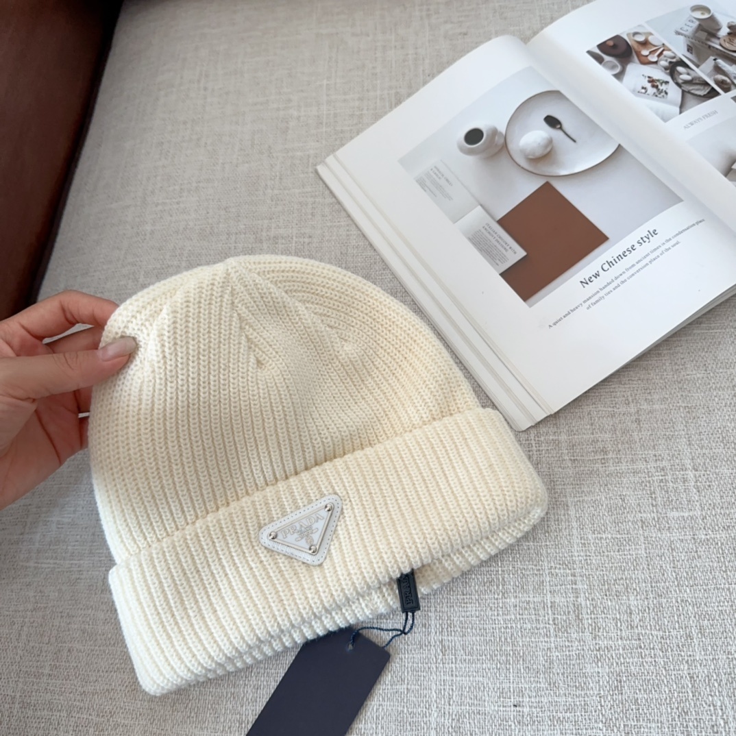 Prada triangle-logo wool-cashmere beanie in white