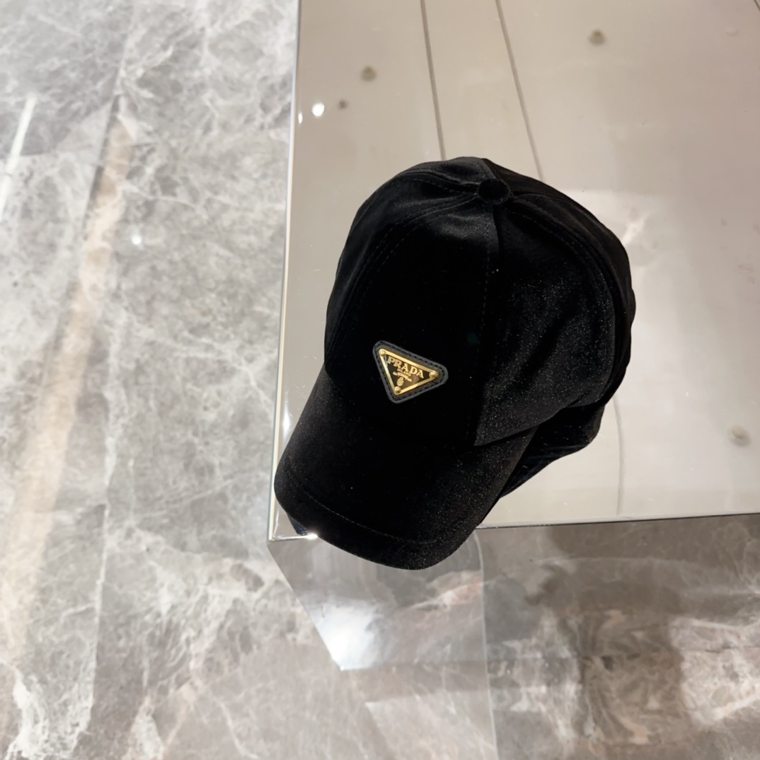 Prada black velvet baseball cap with an enameled metal triangle logo