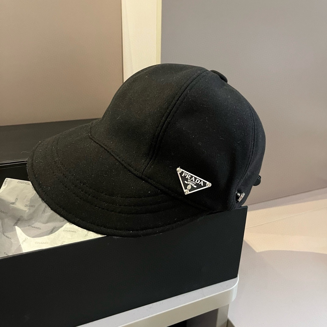 Prada wool-felt baseball cap in black with the iconic enamel triangle logo